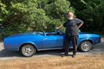 Dave Mitchell with the 1973 Mustang convertible he bought in California to commemorate the Insurance Corporation of British Columbia’s 25th anniversary.