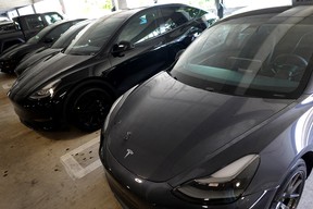 Tesla vehicles in a parking lot on October 21, 2021 in Miami, Florida.