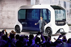 Toyota Motor Corporation President Akio Toyoda, shows the e-Palette autonomous concept vehicle at the Tokyo Motor Show, in Tokyo, Japan October 23, 2019.